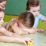School Mental Health Overreach Sparks Parental Outrage Children at a table with building blocks, one child appears upset