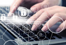 Hands typing with cybersecurity icons overlay.