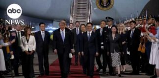 Trump arrives in Beijing for high-stakes summit with Xi