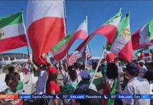 Flag Showdown Erupts Outside World Cup Iranian Americans protest World Cup match in Los Angeles