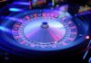 Roulette wheel with ball resting on numbered track
