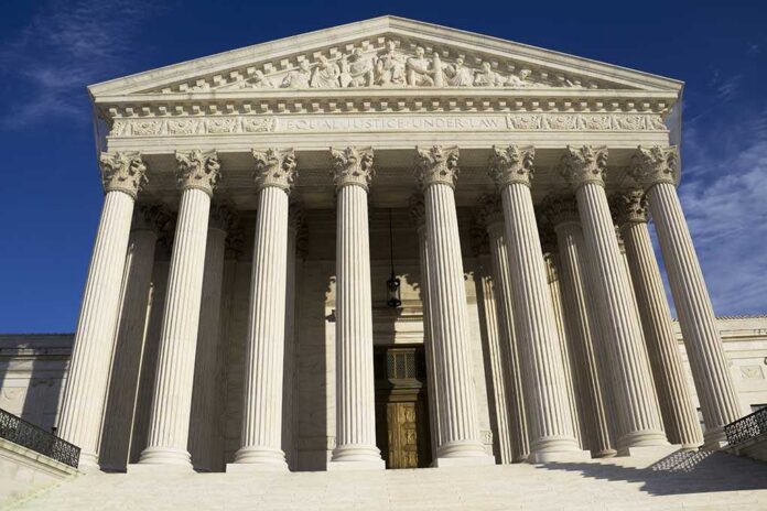 Supreme,Court,Building,In,Washington,,Dc,,United,States,Of,America Facade of the Supreme Court building featuring tall columns and intricate carvings