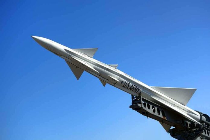 shutterstock_190114949 U.S. Army missile on launch rail against clear blue sky