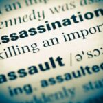 Miller Targets ‘Radical Left’ Networks Close-up of a dictionary page showing the definition of 'assassination'