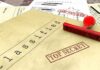 Pentagon Drops Another Unidentified Anomalous Phenomena Trove Classified documents with red Top Secret stamp and rubber stamp