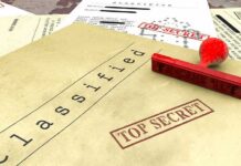 Pentagon Drops Another Unidentified Anomalous Phenomena Trove Classified documents with red Top Secret stamp and rubber stamp