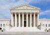 Trump TORCHES His Own Justices Front view of the Supreme Court building with large columns and steps under a blue sky