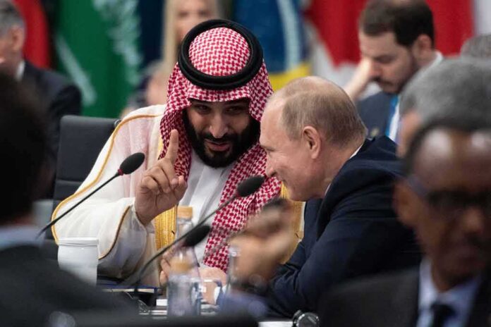 shutterstock_1369295234 Two delegates converse at an international summit table
