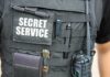 FBI Labels It Terror – But Why No Action? Tactical vest with Secret Service patch and gear