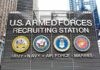 Marines Dangle $15K – Who Actually Qualifies? U.S. Armed Forces recruiting station facade with service emblems
