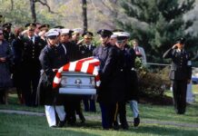 Tally Twist: Another American Gone Curtis Lofton and Dontrelle Inman among honor guard carrying a flag-draped casket at a military funeral