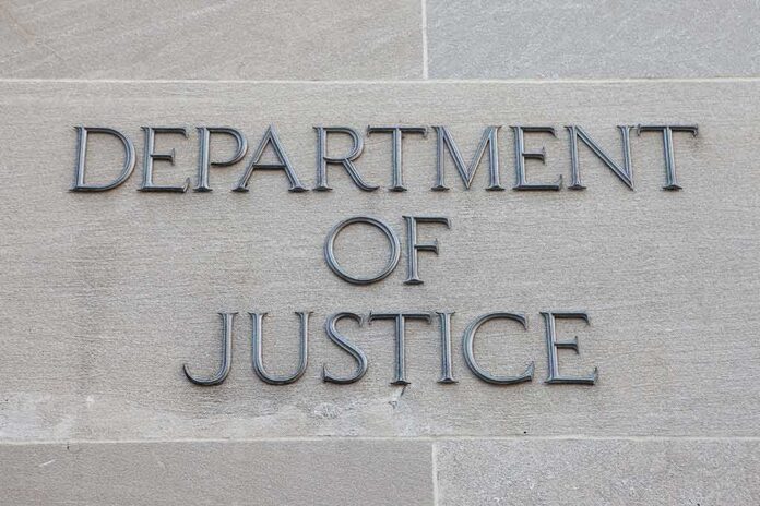 Department of Justice inscription on stone wall