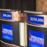 Jeopardy Champ Jailed – Dark Charges Erupt game show podiums with digital displays