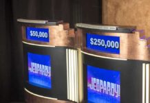 Jeopardy Champ Jailed – Dark Charges Erupt game show podiums with digital displays